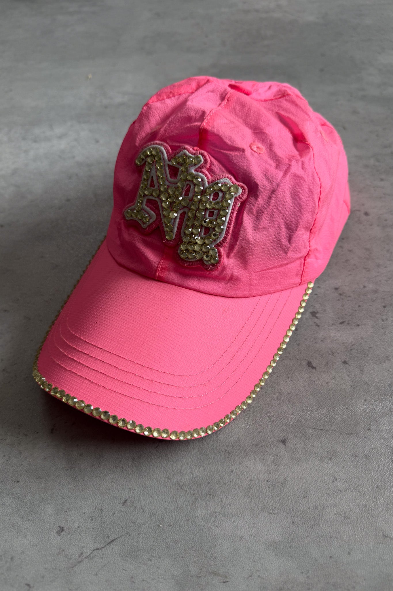 Pink neon diamante sequinned cap