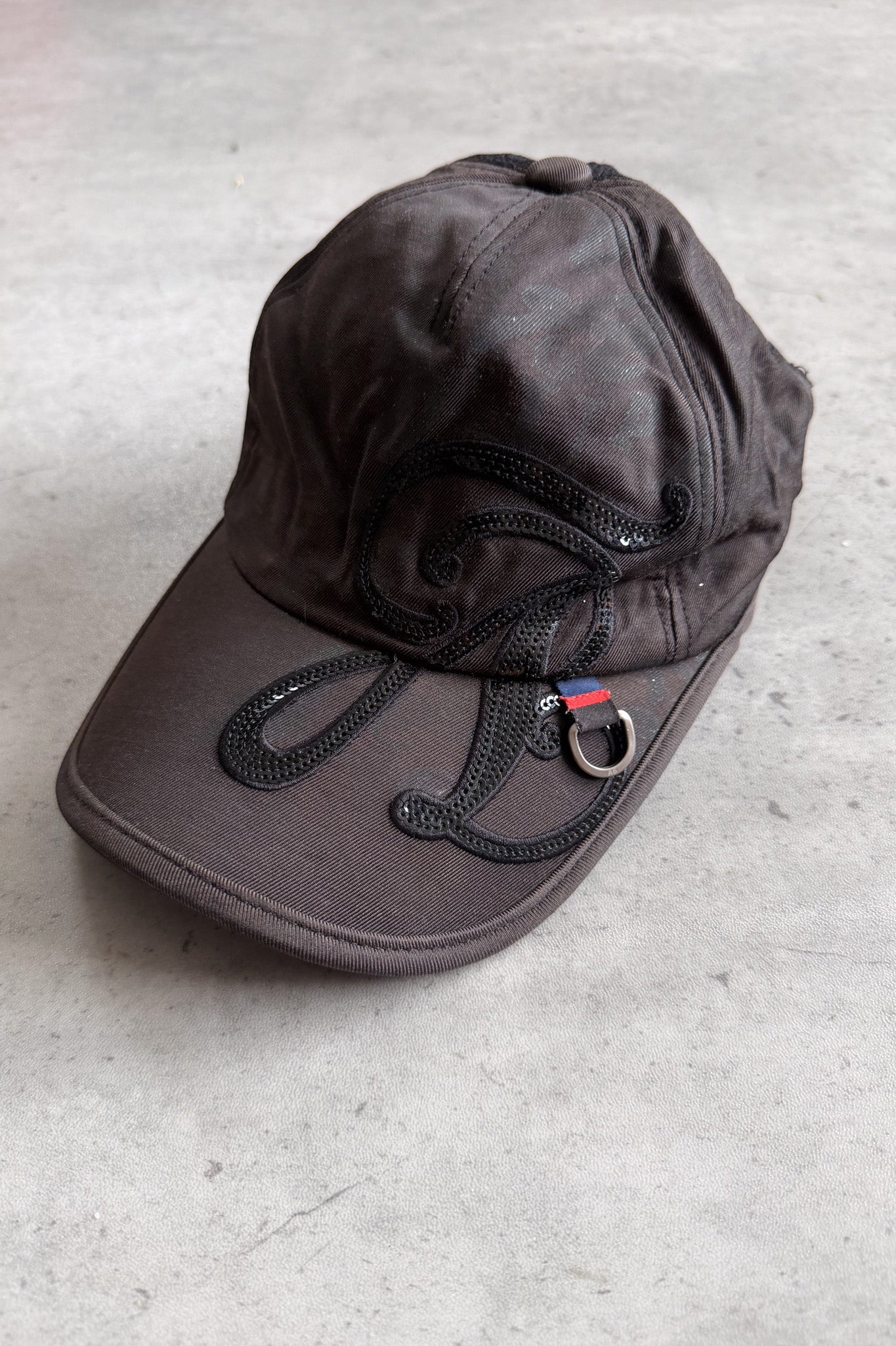 Sequin swirl black cap