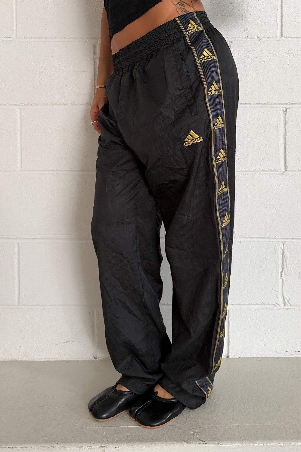 ADIDAS black + gold side logo track pants ★ Size small-medium