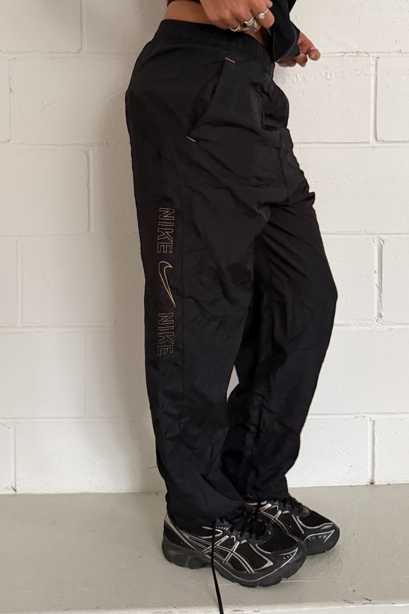 NIKE black + gold side logo track pants ★ Size est xs